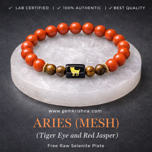 Aries zodiac bracelet with red jasper and tiger eye beads on a selenite plate