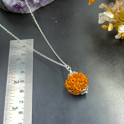7 Mukhi Nepali Rudraksha with German Silver Capping and 4 Gram (15 Inch) Chain | Gemkrishna