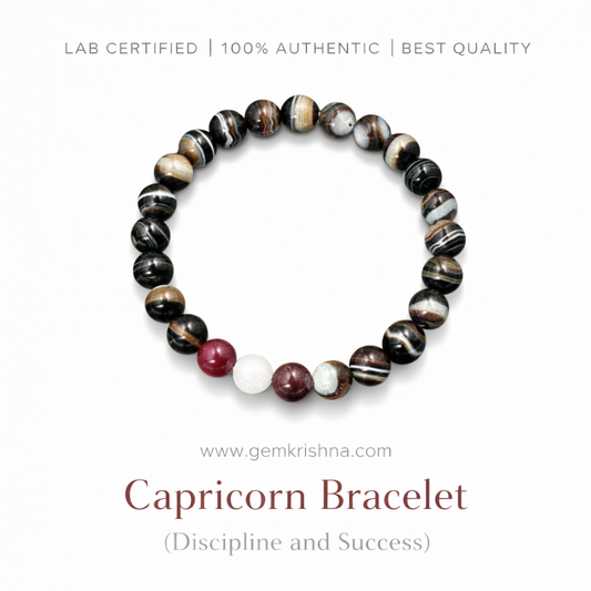 Capricorn bracelet with black striped and brown beads and round stone accents