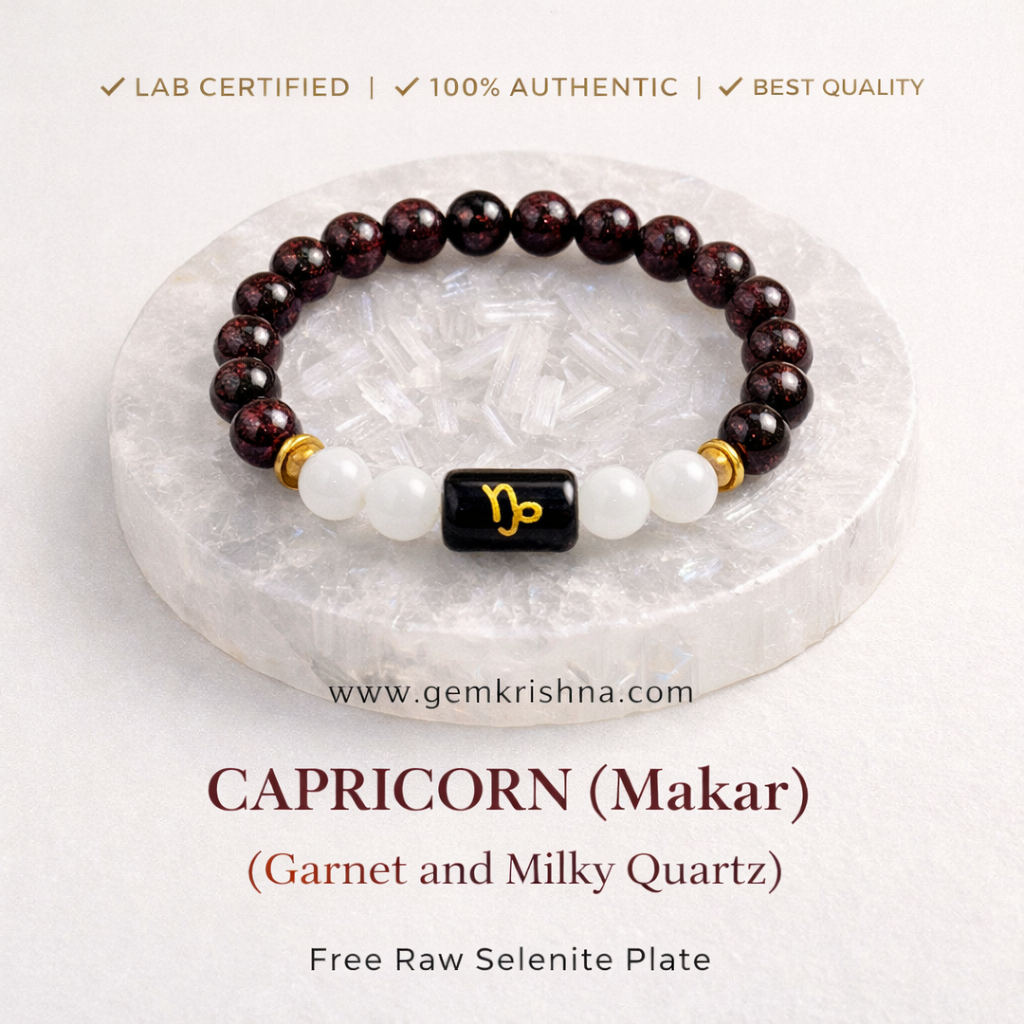 Capricorn zodiac bracelet with garnet beads, milky quartz beads, black enamel charm and gold accents