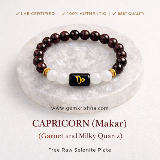 Capricorn zodiac bracelet with garnet beads, milky quartz beads, black enamel charm and gold accents