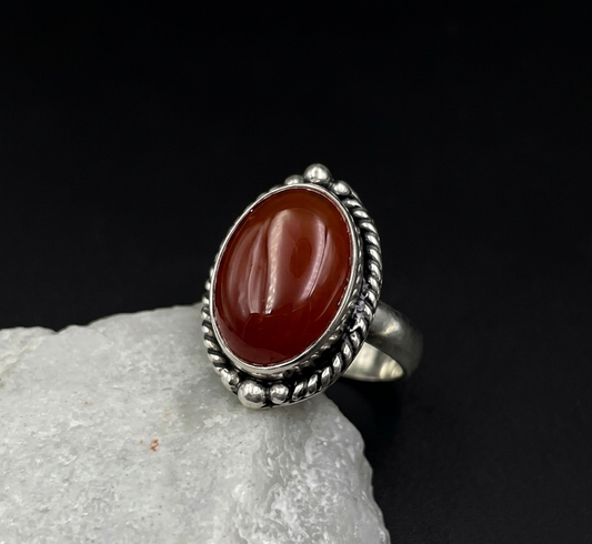 Carnelian silver ring with antique finish sterling silver setting and oval red gemstone