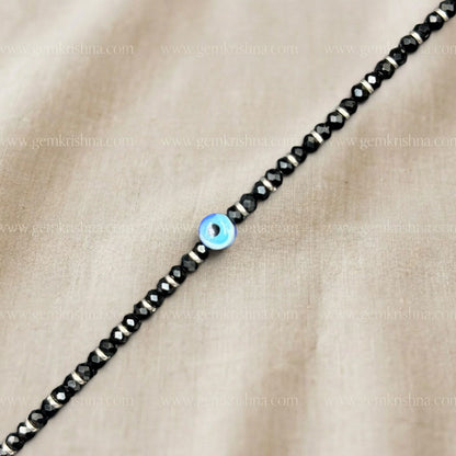 Black onyx 925 silver nazar kavach bracelet close-up of blue evil eye bead and black beads