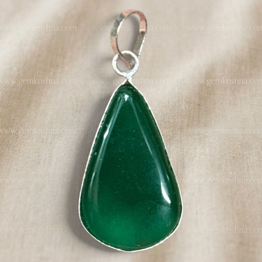 Close-up of green onyx pear-shaped locket pendant with silver-tone metal frame
