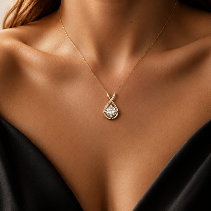CZ solitaire sterling silver pendant with teardrop halo on a necklace