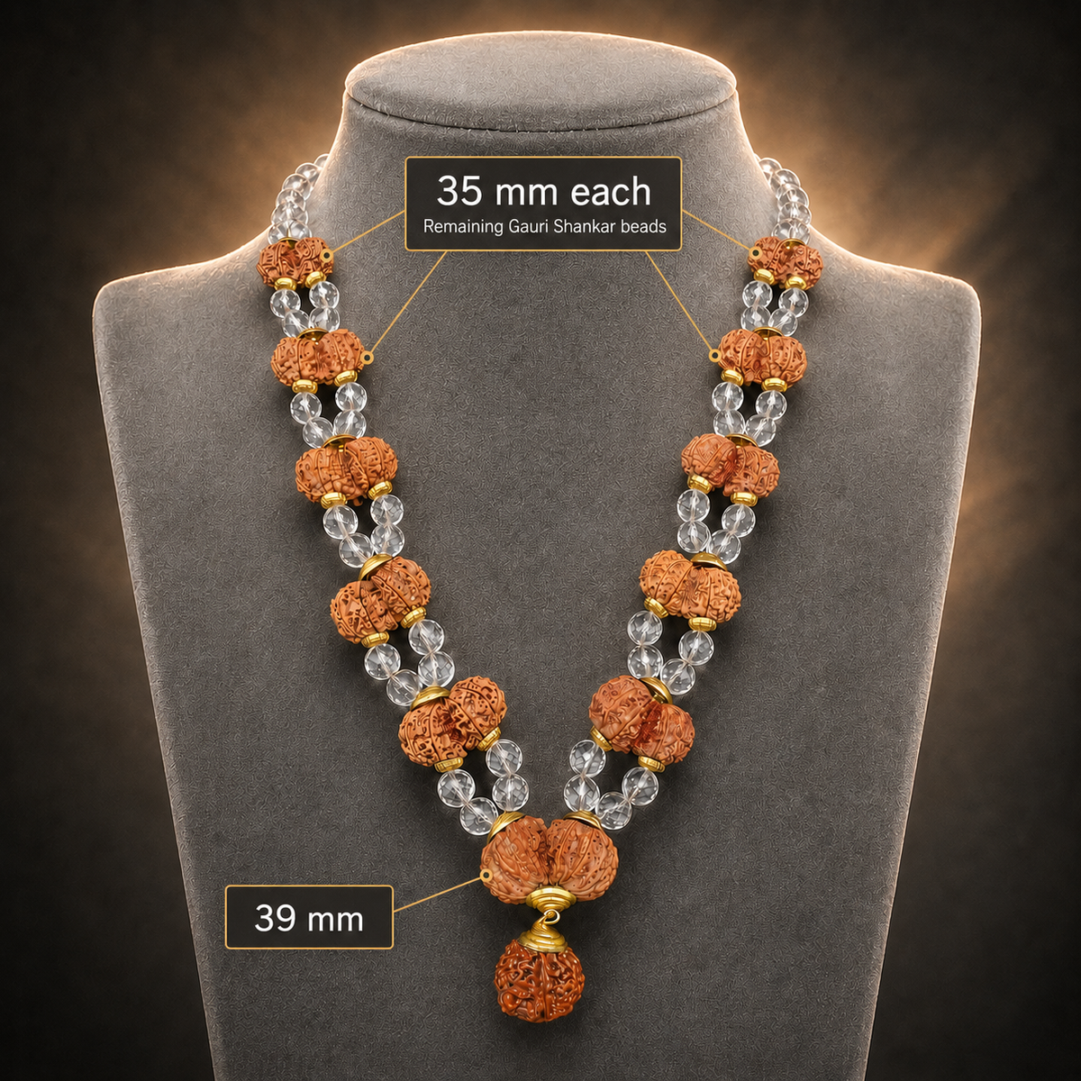 Double-strand rudraksha mala on bust with clear crystal beads and gold-toned Gauri Shankar details