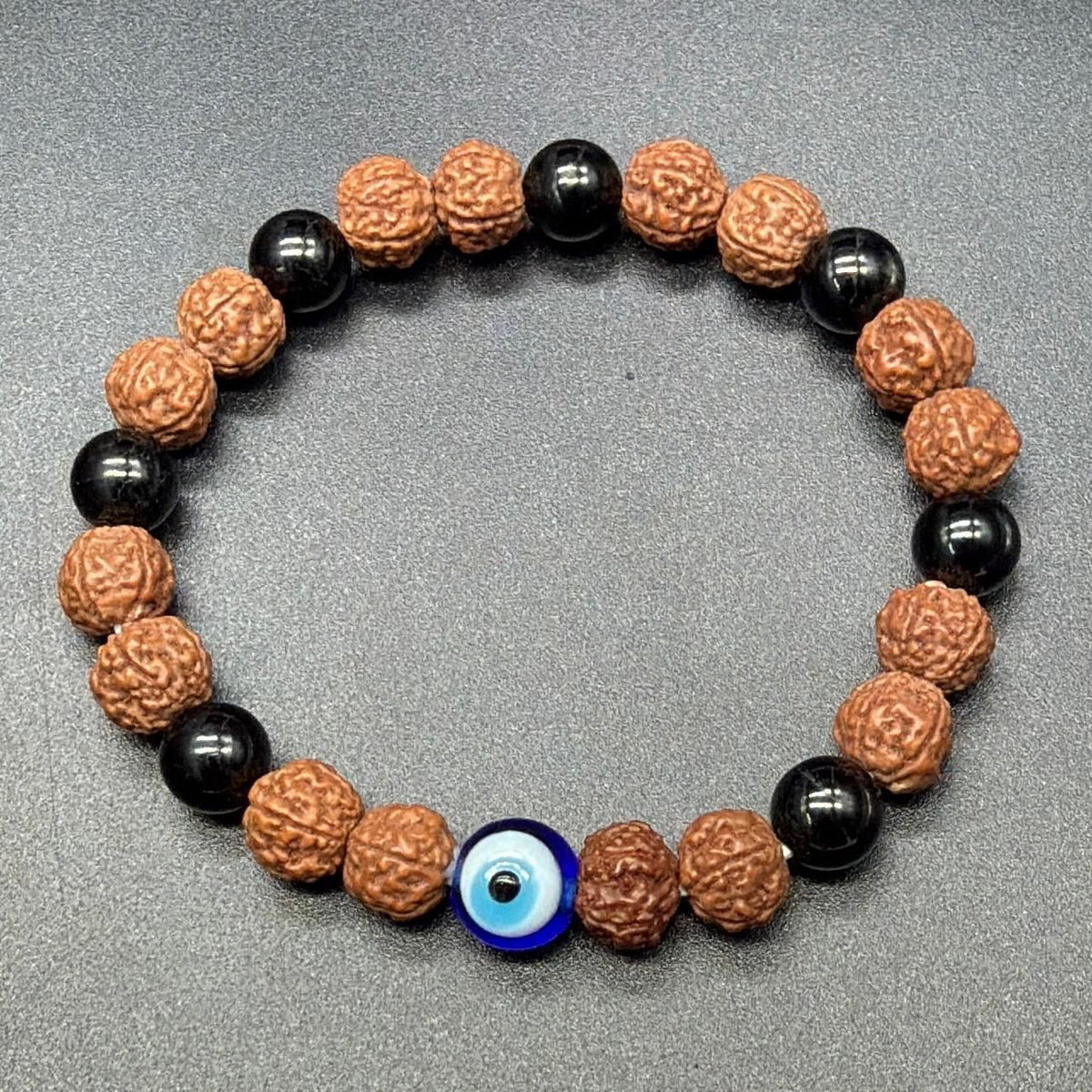 tourmaline and rudraksha with evil eye bead custom bracelet by gemkrishna