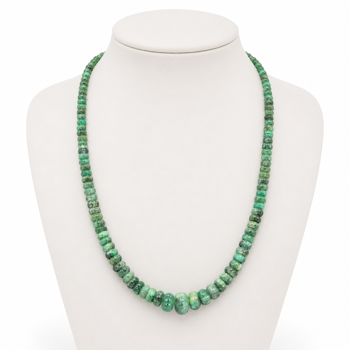 Emerald graduated bead necklace for growth and harmony, front view on white bust