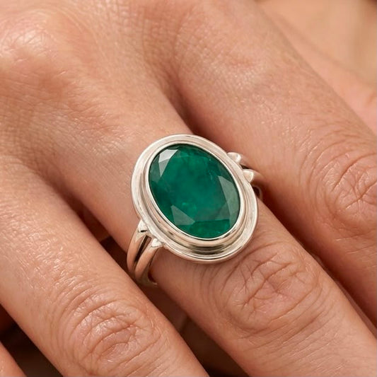 925 silver emerald panna ring on fingers with green oval gemstone bezel setting