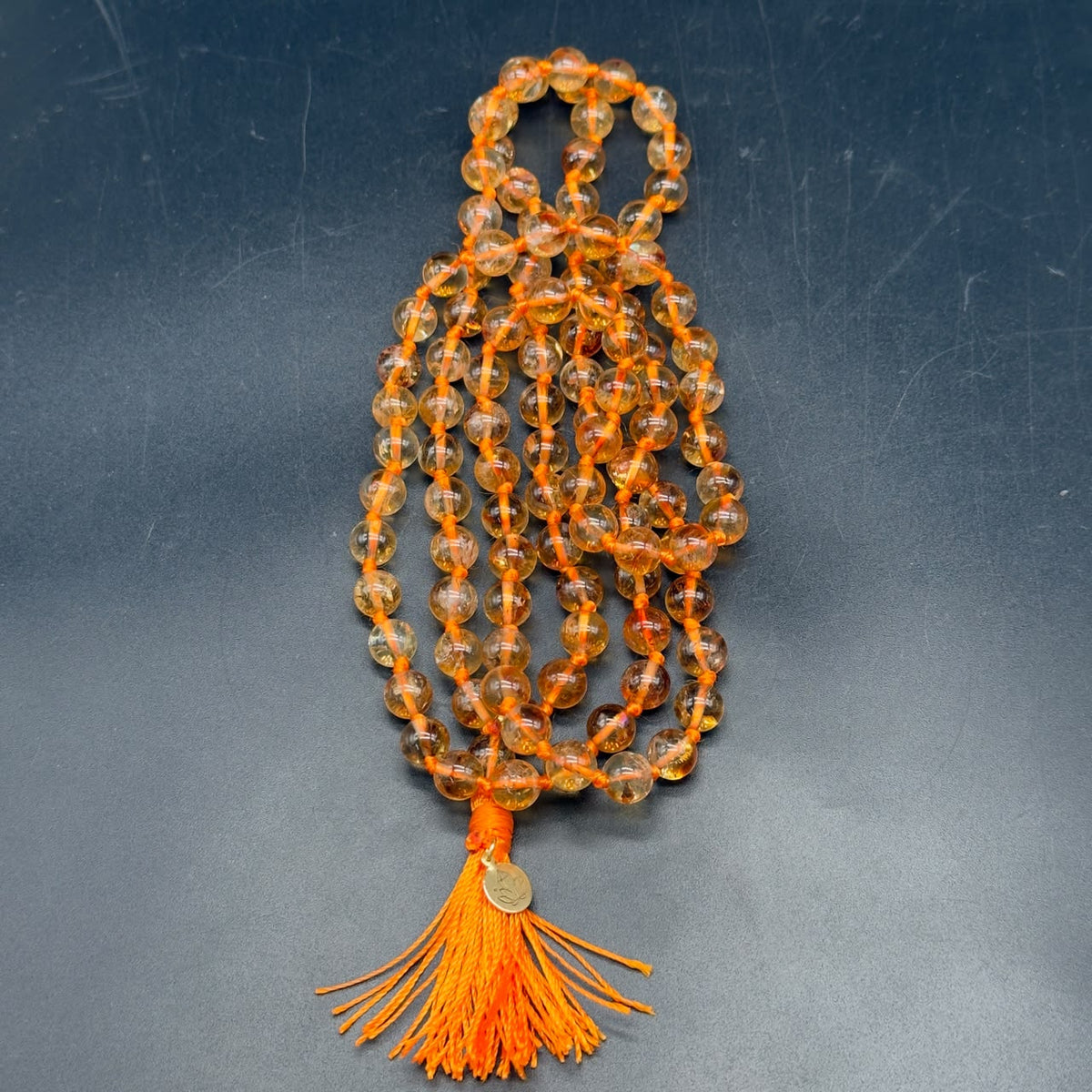 Citrine AAA Jaap Mala natural untreated orange thread tassel GemKrishna