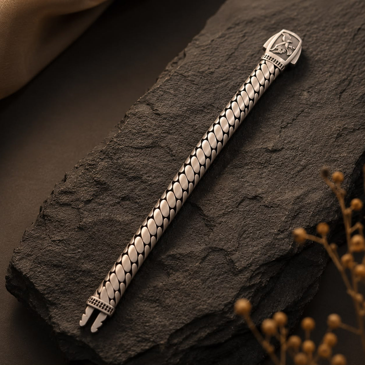 Foxtail weave 925 sterling silver bracelet clasp and woven links on dark slate