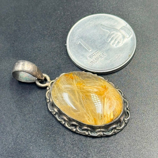 Golden rutile quartz locket pendant in 925 silver with golden crystal oval centerpiece