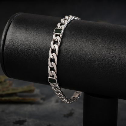 Green stone curb link 925 sterling silver bracelet on a black leather bracelet display