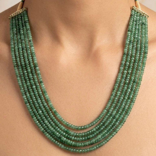 Green onyx mala necklace showing six strands of small gemstone beads with gold-tone clasp