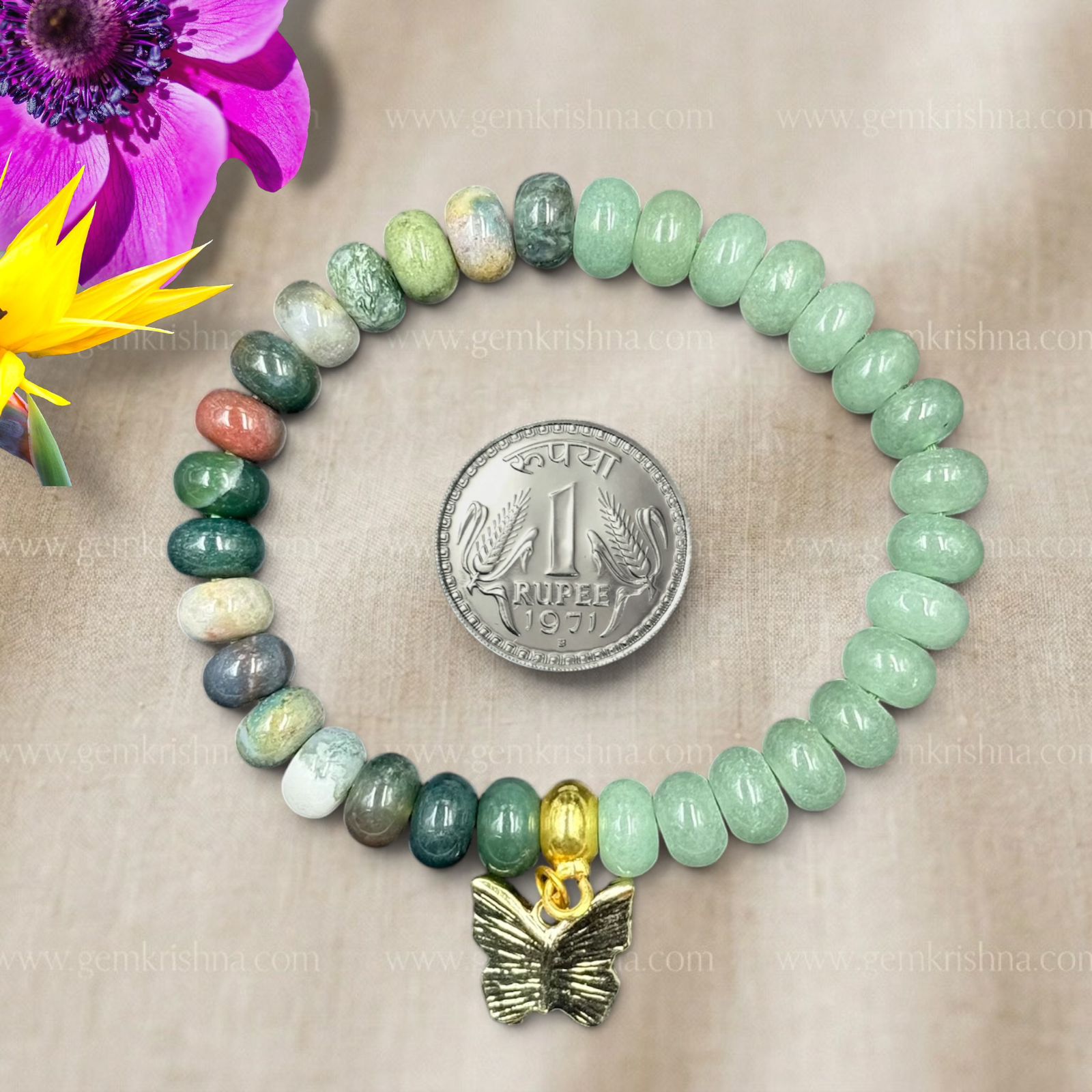 Indian agate and green aventurine rondelle beads bracelet laid flat with flower decor