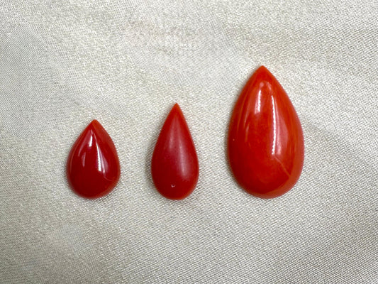 Natural Japanese Red Coral (Moonga)  Pear Shape 3 piece 1.25x9.26 mm 3.08 ct  15.30x8 mm 4.11 ct  22.33x12.88 mm 8.69 c