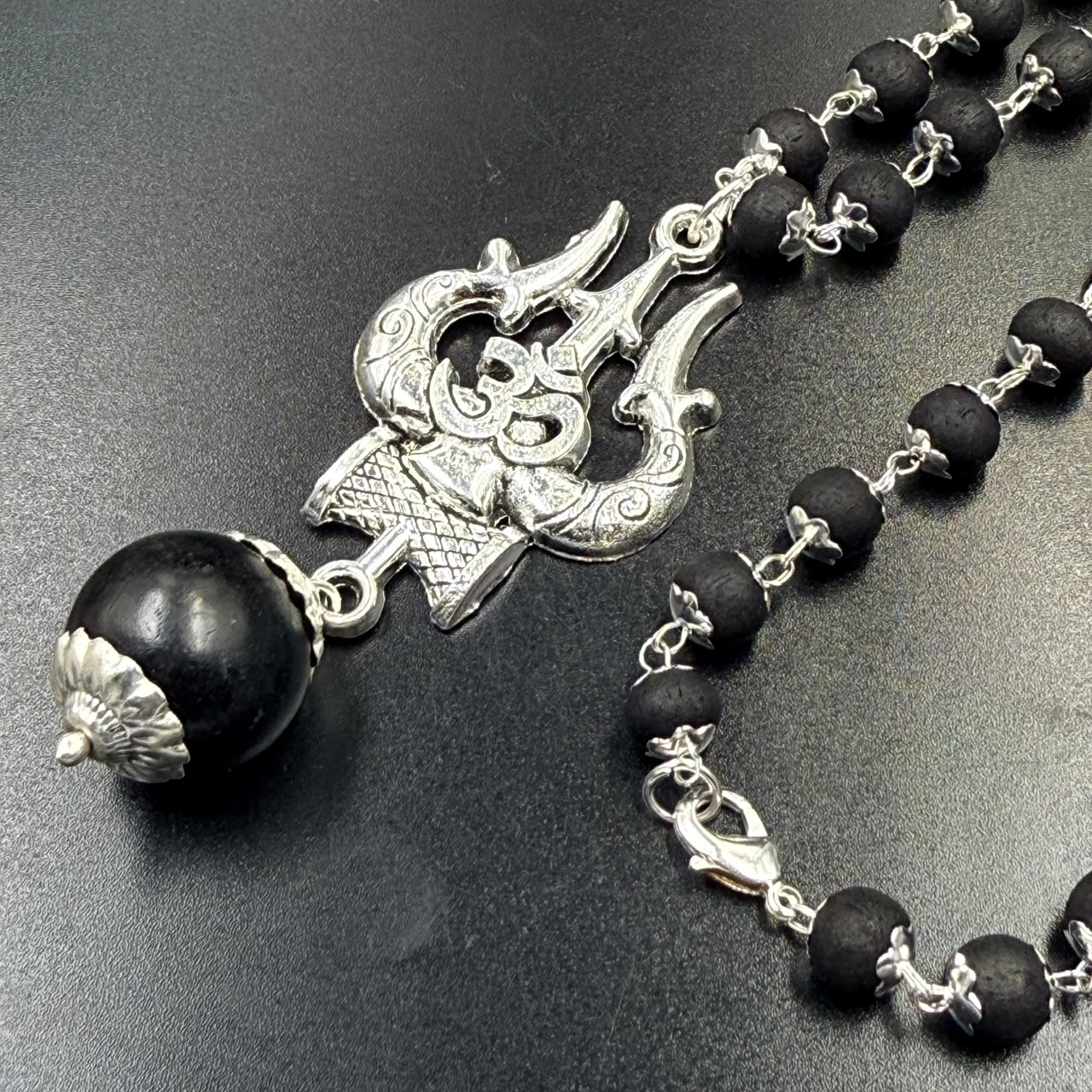 Karungali bead mala with Om Trishul metal pendant and black beads with silver chain links