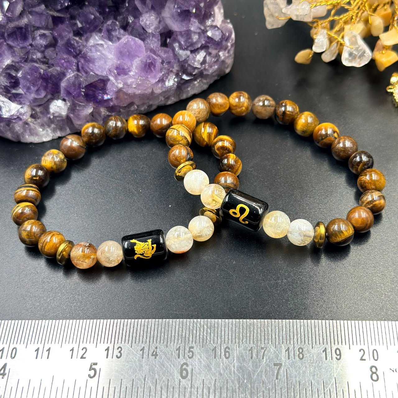 Close view of Leo (Singh) zodiac bracelet beads with tiger eye and citrine plus black Leo charm