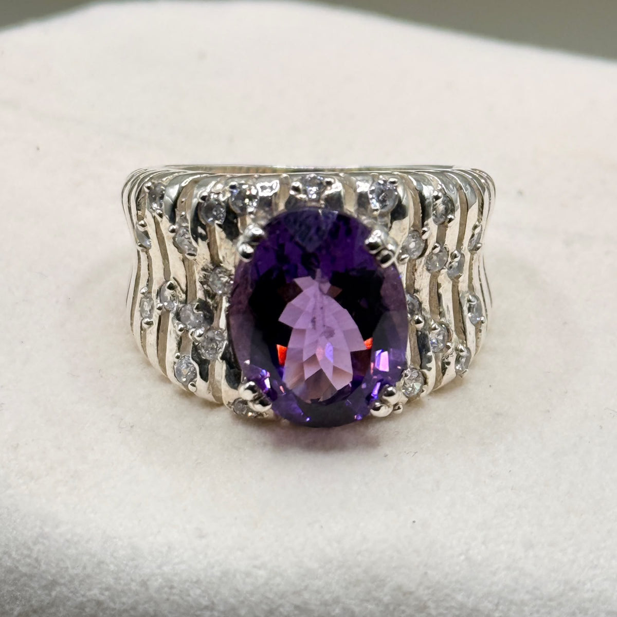 Natural amethyst oval faceted sterling silver ring with white accent stones, statement broad band