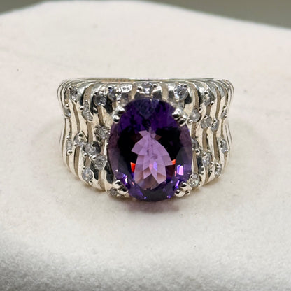 Natural amethyst oval faceted sterling silver ring with white accent stones, statement broad band