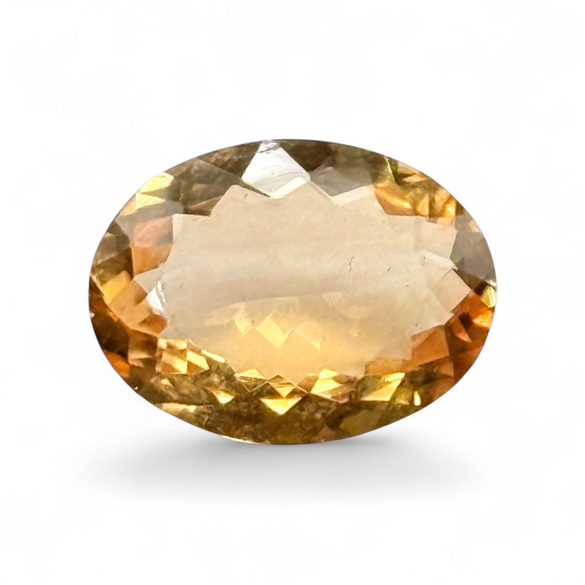 Natural citrine oval mixed cut gemstone front view with sparkling facets