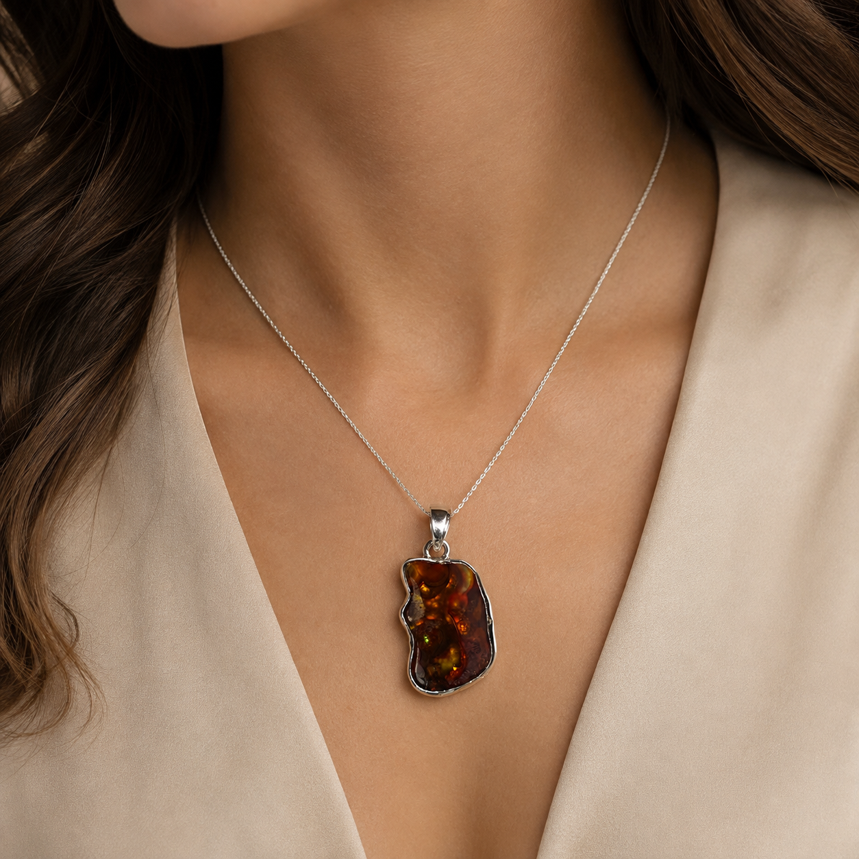 Natural fire agate 925 silver freeform pendant necklace worn on model neckline