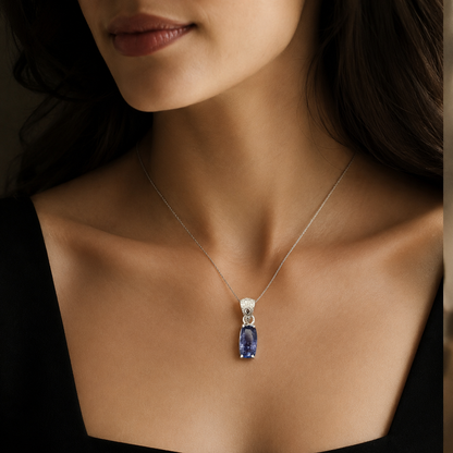 Natural tanzanite and lab-grown diamond pendant in 925 silver worn on a necklace