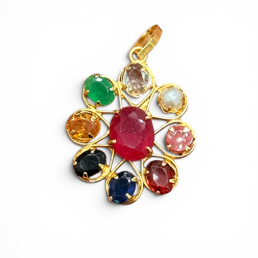 Navratan panchdhatu pendant with multicolor gemstones and ornate gold-tone setting