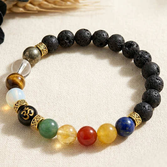 Nine Stone AstroBalance multi gemstone bracelet with lava beads and Om charm on bracelet