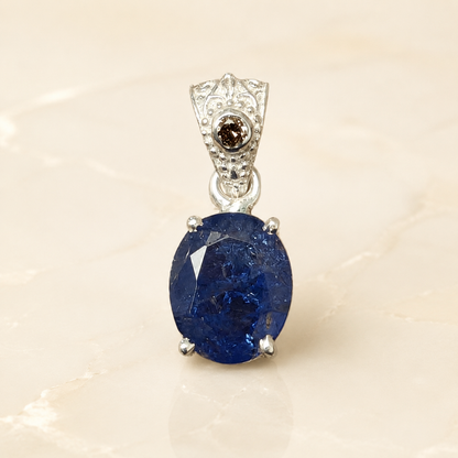 Natural tanzanite and lab-grown diamond pendant front view in 925 silver with oval gemstone