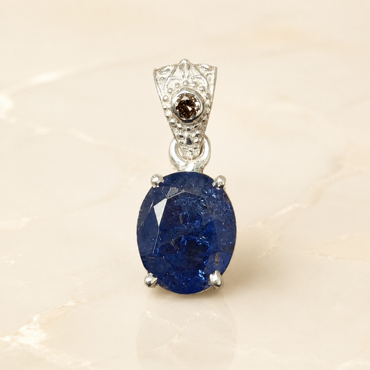 Natural tanzanite and lab-grown diamond pendant front view in 925 silver with oval gemstone