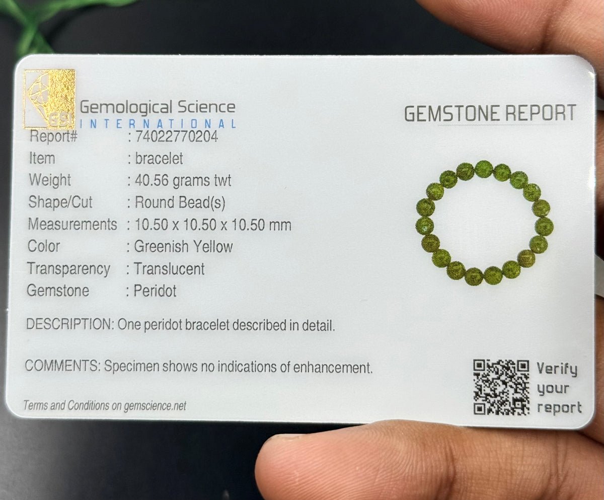 Gemstone report card for Peridot Gem Quality Bracelet showing weight, shape, color, and transparency details