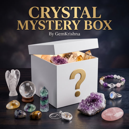 Premium Crystal Mystery Box gift set with open box revealing purple and clear crystals