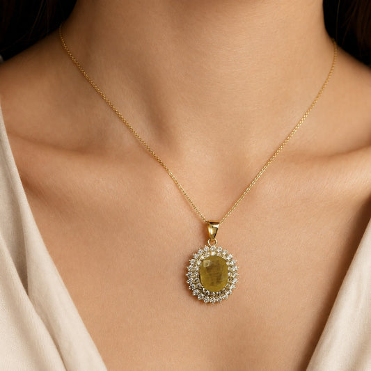 925 silver yellow sapphire pukhraj locket pendant on a fine gold chain near the neck