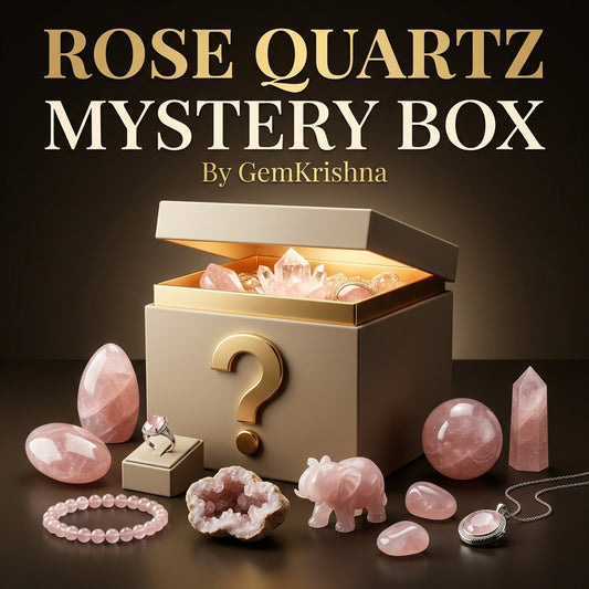 Rose Quartz Crystal Mystery Box with polished stones, carved elephant, geode, ring, pendant, and bracelet