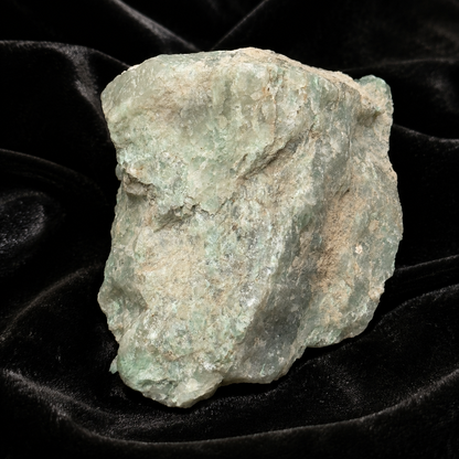 Raw rough Amazonite crystal stone in pale aqua and white on black velvet