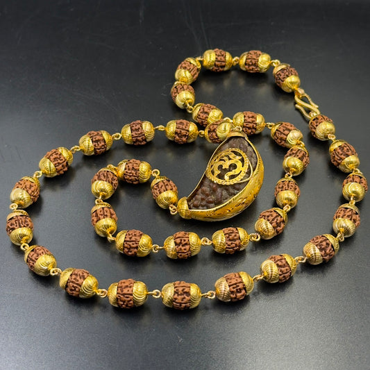 Gold-plated 925 silver rudraksha mala featuring Om pendant teardrop centerpiece