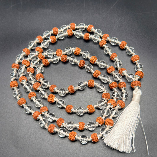 Rudraksha and clear quartz mala beads with 925 silver caps and white tassel
