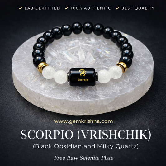 Scorpio zodiac bracelet with black obsidian beads and milky quartz accents on a selenite plate