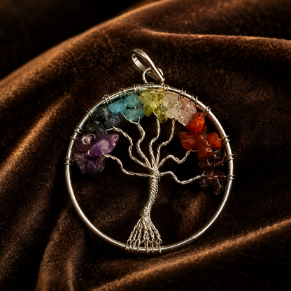 7 chakra tree locket pendant with colorful gemstone clusters on a silver wire frame