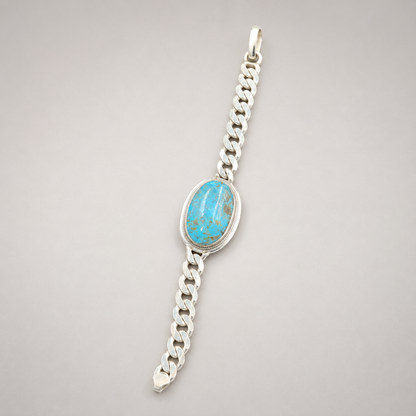 Silver curb link oval turquoise bracelet with large oval blue stone pendant centerpiece