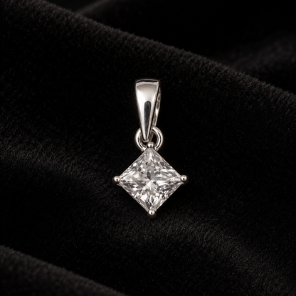 925 silver princess cut moissanite solitaire pendant with a faceted square gem on black velvet