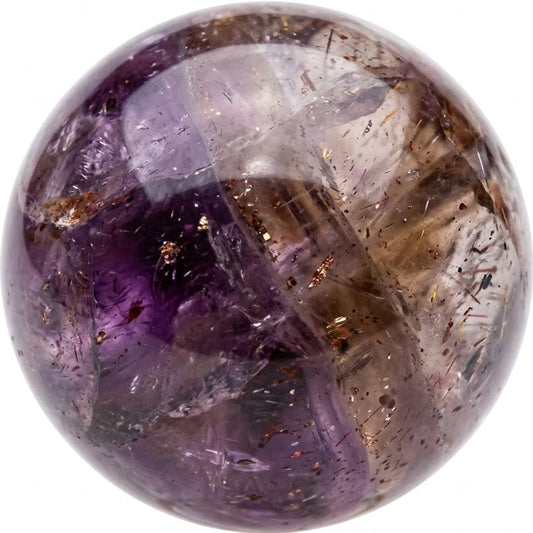 Illustration of a polished Super Seven bead; natural colour and pattern vary
