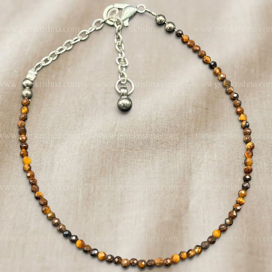 Tiger’s eye anklet with faceted beads, circular clasp ring, and silver heart charm